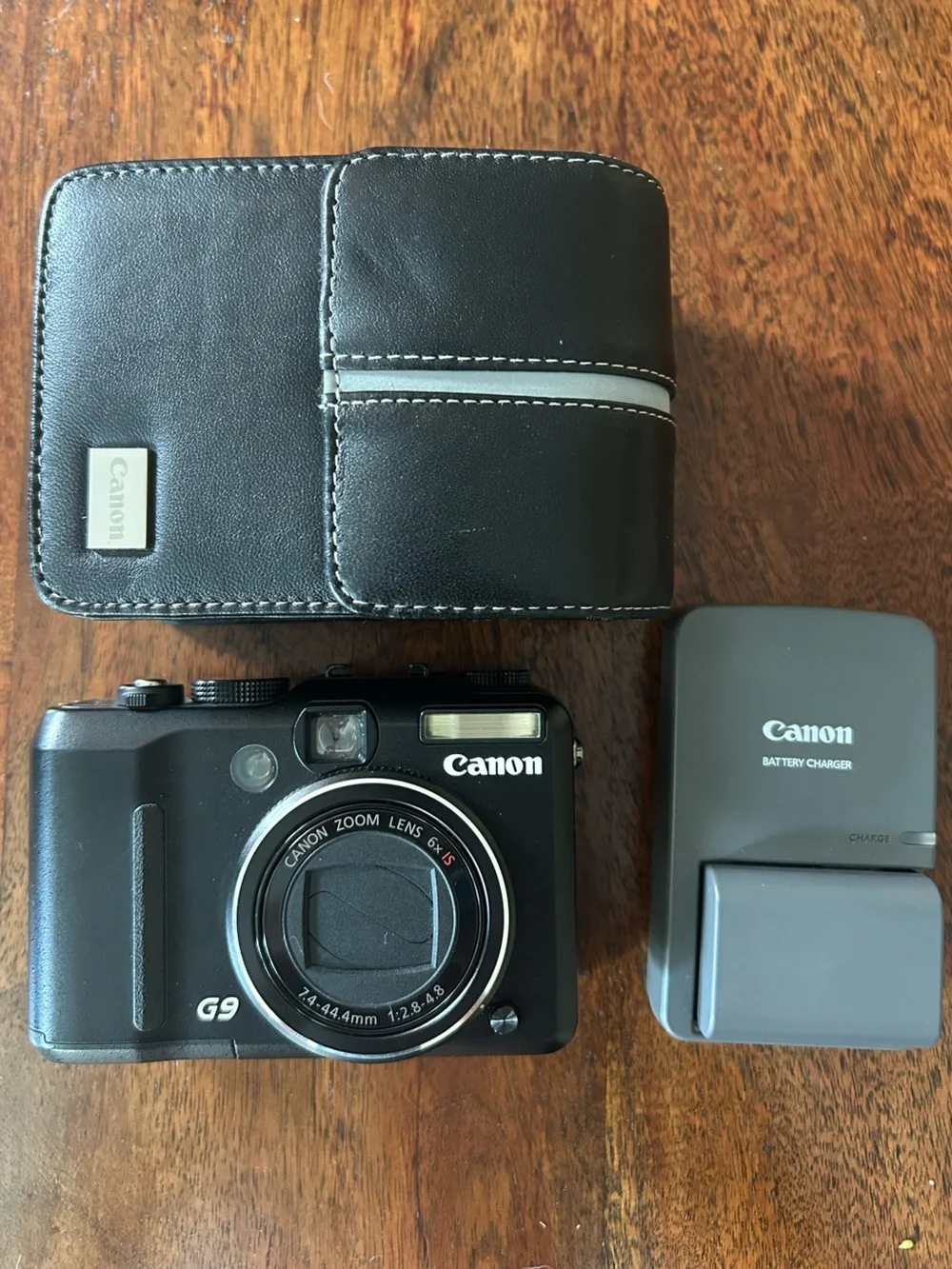 Canon PowerShot G9 Compact Digital Camera with Black Case and Gray Charger